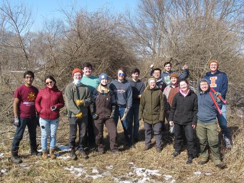 Group of Red Bison students participate in a work day